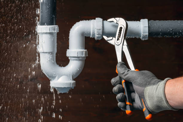 Professional Emergency Plumber technician working in Montezuma, IA
